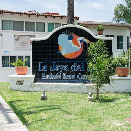 Capital O La Joya Del Lago Ахихик Екстериор снимка
